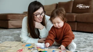 Au pair acompañando a una niña mientras arma un rompecabezas en casa